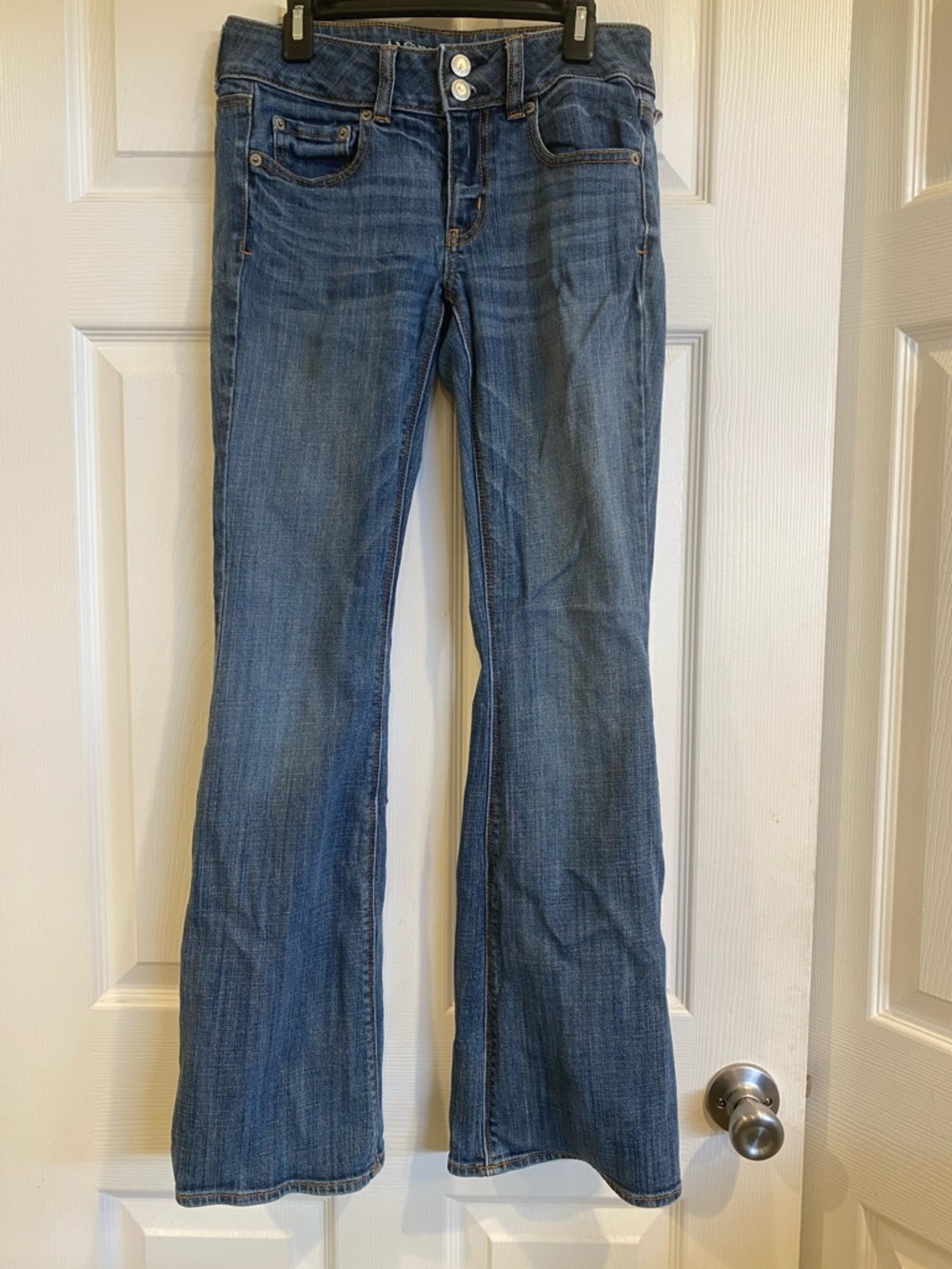 American Eagle Outfitters Medium Blue Flare Jeans belt look as broken